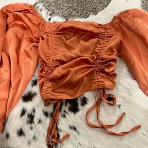orange silk top